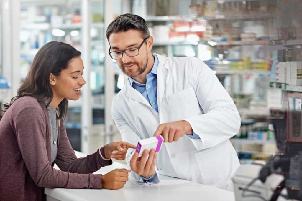 pharmacist helping a woman